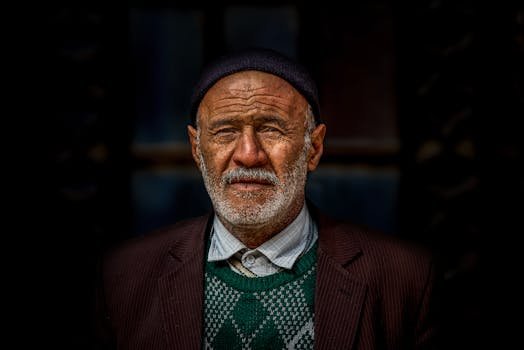 pexels photo 30773222 30773222 Close-up portrait of a senior man in Markazi Province, Iran, showcasing character and culture.